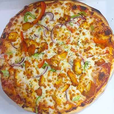 Pizza de verduras con una gran variedad ingresientes naturales